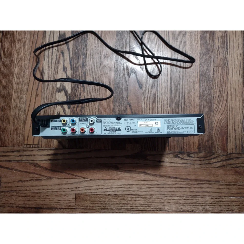 Sony DVP-SR210P Ultra Slim CD/DVD Player - Powers On / Ejects Includes Manual